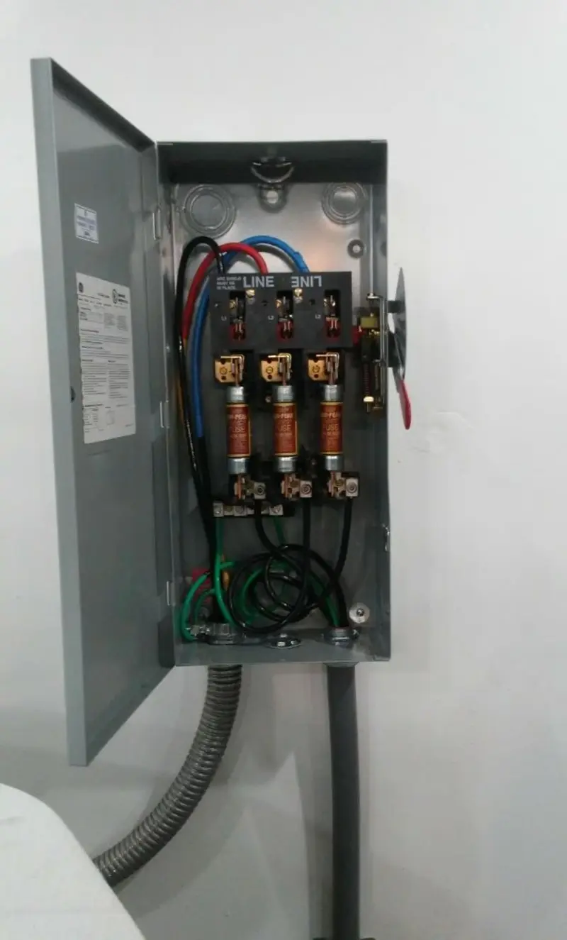 Three-phase disconnect switch installed for Smoke Detector Installation in Hancock
